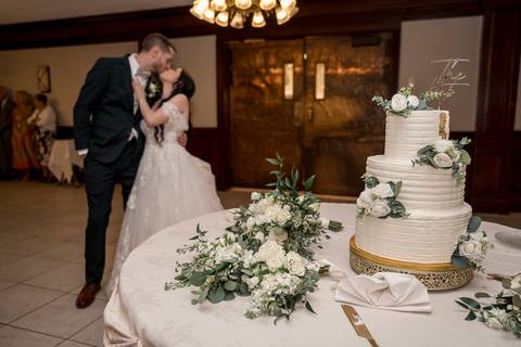 Time for dessert! Jeffrey & Kiara cutting their beautiful wedding cake during the reception at the Aqua Turf Club.'
