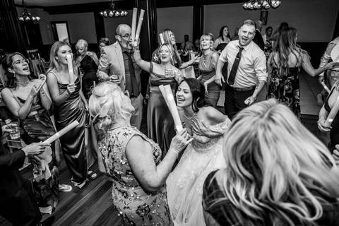 The dance floor was ON FIRE! Jeffrey & Kiara celebrating with their friends. High-energy Aqua Turf Club reception!'
