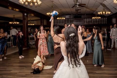 The dance floor was ON FIRE! Jeffrey & Kiara celebrating with their friends. High-energy Aqua Turf Club reception!'
