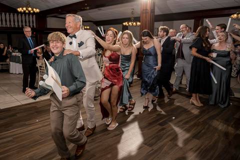 The dance floor was ON FIRE! Jeffrey & Kiara celebrating with their friends. High-energy Aqua Turf Club reception!'