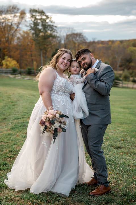 Family wedding portrait with bride, groom, and daughter at Nuzzo’s Farm by Vanessa Trettel, CT Wedding Photographer serving NY'