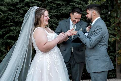 Emotional ring exchange moment at Nuzzo’s Farm in Branford CT by Vanessa Trettel, CT Wedding Photographer serving NY'