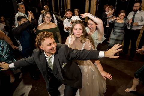 Nighttime wedding celebration with guests at Nuzzo’s Farm by Vanessa Trettel, CT Wedding Photographer serving NY'