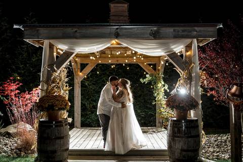 Dramatic nighttime wedding photo with flash at Nuzzo’s Farm by Vanessa Trettel, CT Wedding Photographer serving NY'