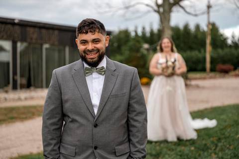 Bride and groom sharing an intimate first look moment at Nuzzo’s Farm by Vanessa Trettel, CT Wedding Photographer serving NY'