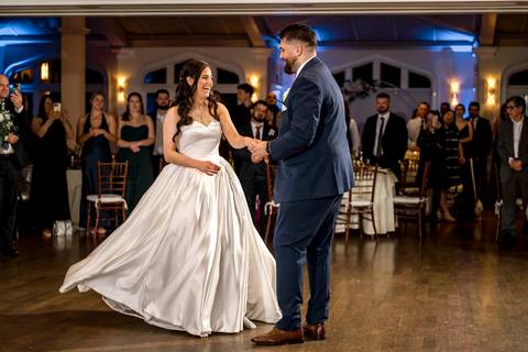 Atmospheric first dance photo with professional lighting, capturing the emotional connection at this Rye NY wedding by Vanessa Trettel Photography.'