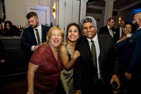 Guests celebrating and dancing the night away, vibrant party photos at Whitby Castle by Vanessa Trettel Photography.'