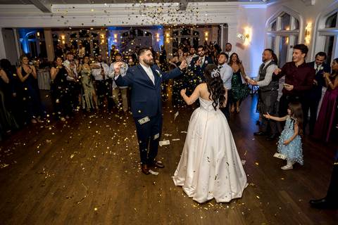 Guests having a blast on the dance floor at Whitby Castle, energetic reception moments captured by Vanessa Trettel Photography.'