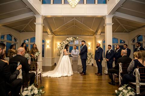 Close-up of Nick and Emina exchanging wedding rings at the altar, intimate ceremony details by NY Wedding Photographer Vanessa Trettel Photography.'