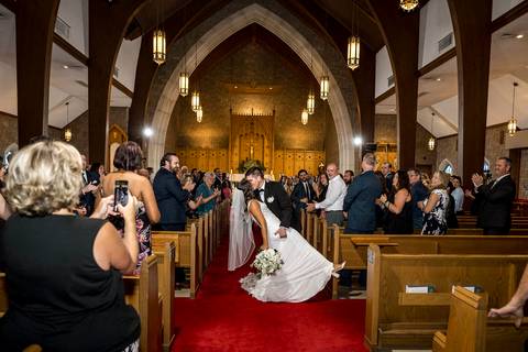Joyful exit: The couple celebrating their first moments as husband and wife.
Vanessa Trettel Photography
Wedding photo at Anthony's Ocean View | New Haven CT '