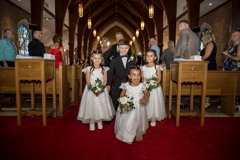 Flower girl and ring bearer walking out of the church together.
Vanessa Trettel Photography
Wedding photo at Anthony's Ocean View | New Haven CT '
