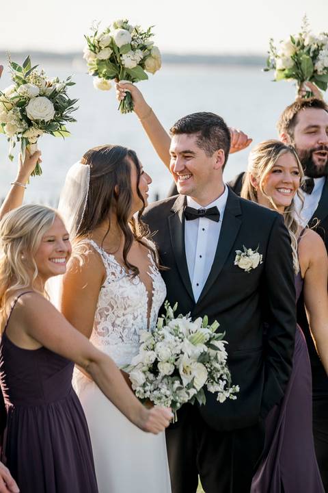 Groomsmen and bridesmaids laughing on the New Haven shoreline.
Vanessa Trettel Photography
Wedding photo at Anthony's Ocean View | New Haven CT '