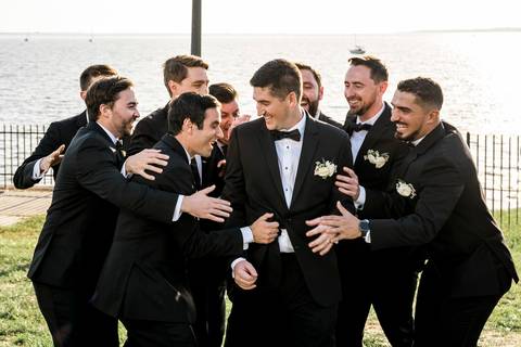 Alison laughing with her bridesmaids at the water's edge.
Vanessa Trettel Photography
Wedding photo at Anthony's Ocean View | New Haven CT '