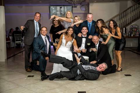 The couple laughing during the speeches at their wedding.
Vanessa Trettel Photography
Wedding photo at Anthony's Ocean View | New Haven CT '