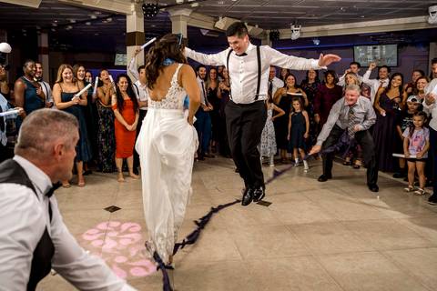 Alison getting ready to toss her bouquet to the single ladies.
Vanessa Trettel Photography
Wedding photo at Anthony's Ocean View | New Haven CT '