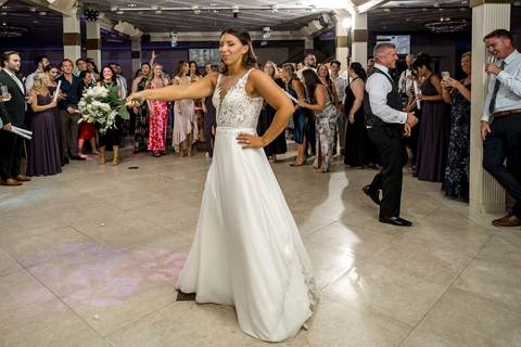 The excitement of the bouquet toss at the reception.
Vanessa Trettel Photography
Wedding photo at Anthony's Ocean View | New Haven CT '