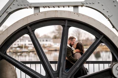 Close-up of the couple embracing on the historic Mystic bridge with fog in the background.
Vanessa Trettel Photography
engagement photo at Mystic CT'