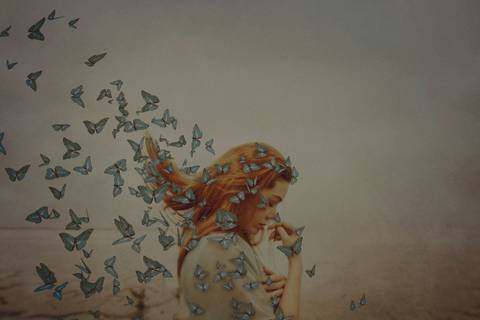 ensaio fotografico feminino no meio das borboletas'