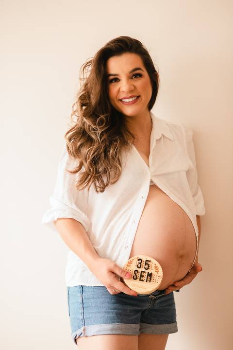 ensaio gestante em conselheiro lafaiete'