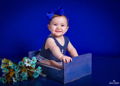 Foto de bebê com azul'