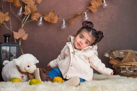 Cenário de bebê para foto com ovelhinha e bergamota'