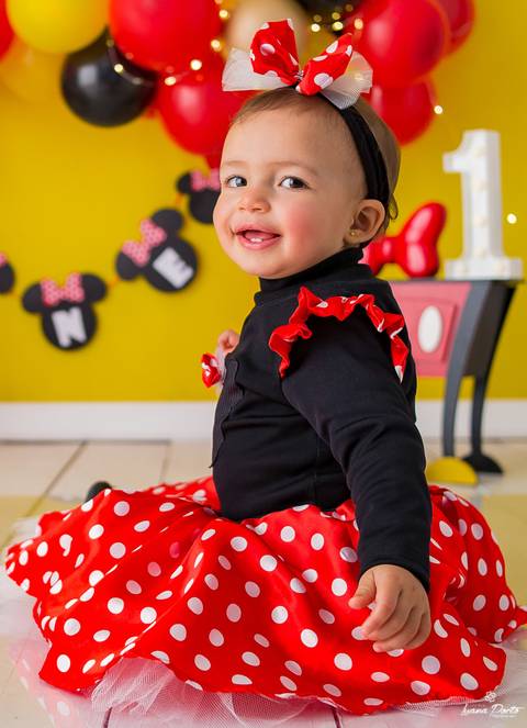 Bebê vestida de Minier'