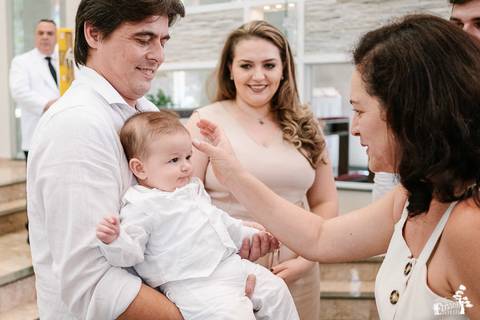 Foto de batizado na igreja são josé operário, em Maringá'