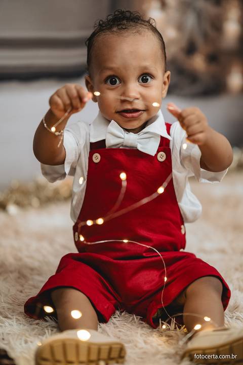 Fotografia de ensaio de Natal em estúdio temático com cenário em Vitória - ES'