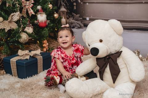 Fotografia de ensaio de Natal em estúdio temático com cenário. Fotografia de Família em Vitória - ES '