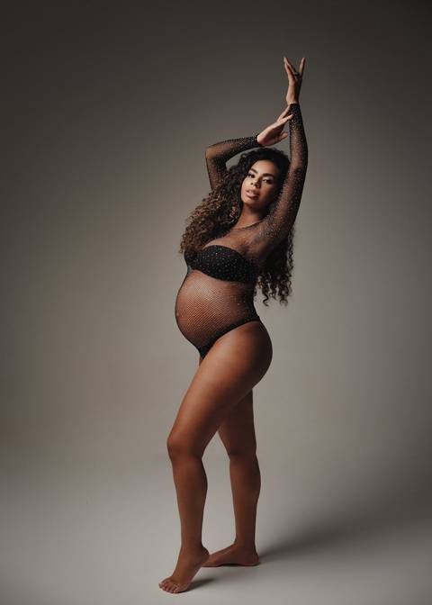 Body de gestante em predaria '