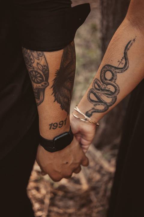 casal tatoado'