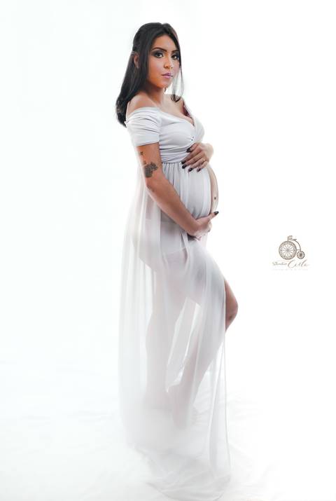 imagem de gestante em ensaio fotográfico'