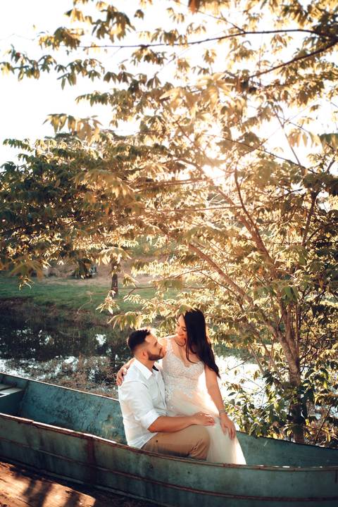 foto de casal no lago barco'