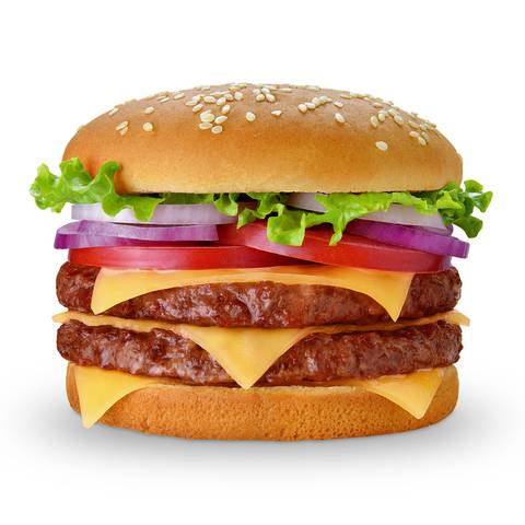 Fotografía publicitaria de José Chiodini que muestra una hamburguesa gourmet con doble carne, queso cheddar, tomate, cebolla morada y lechuga fresca. Imagen ideal para campañas gastronómicas y menús digitales.'