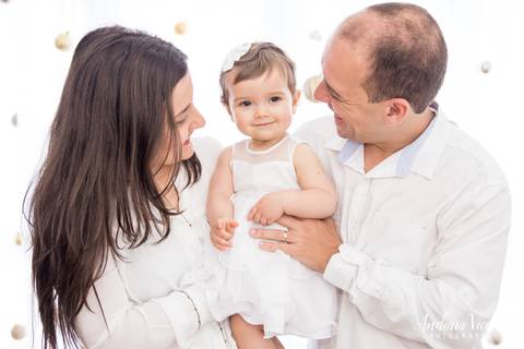 foto de criança com os pais. mini ensaio natal fotografia'