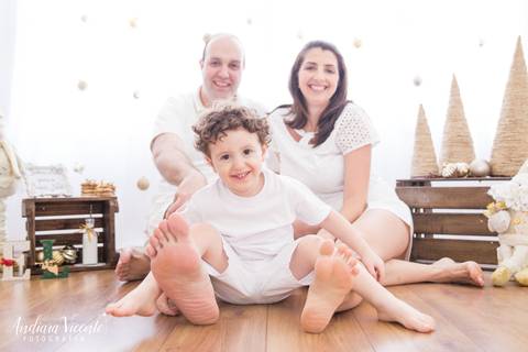 foto de criança com os pais. mini ensaio natal fotografia'