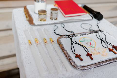 Detalhes da cerimônia de batizado'