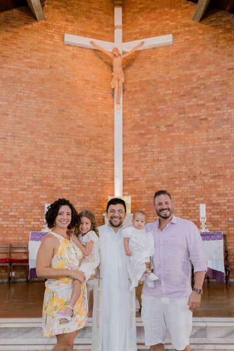 Registro da família durante batizado em BH'