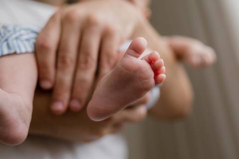 Ensaio de bebê com luz natural'