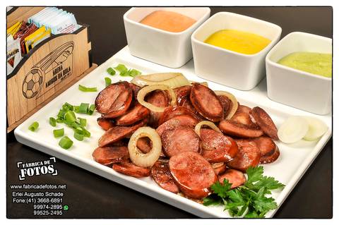Fotografia de Gastronomia /Calabresa com cebola frita'