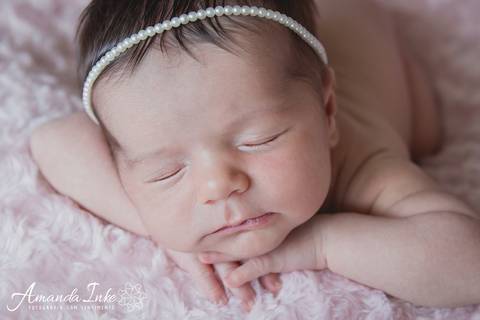 Rostinho de bebê no ensaio newborn feito em domicílio em Moema, São Paulo'