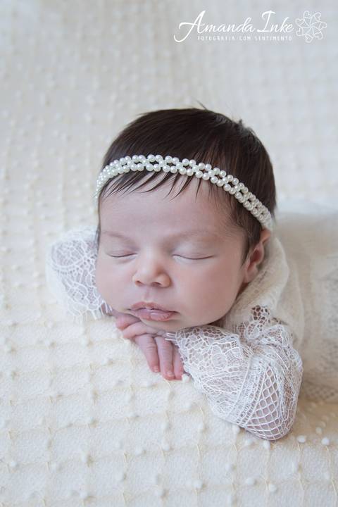 Close do rostinho de bebê no ensaio newborn em São Paulo'