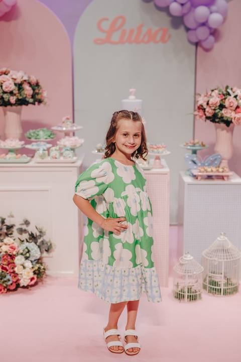 Aniversário de 7 anos com tema de jardim'