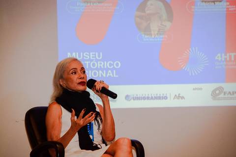 Palestra institucional da UNIGRANRIO focada em empreendedorismo e bem-estar durante evento corporativo no RJ.'