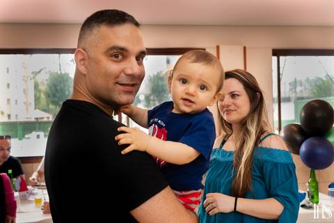 Foto de pai segurando o filho no aniversário em São Bernard do Campo - SP'