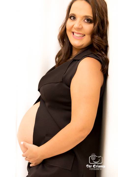 Ensaio gestante com blusa preta '