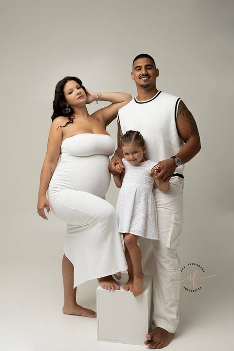 Sessão fotográfica de grávida com a família'