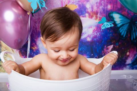 hora do banho no ensaio smash the cake tema jardimd e borboleta, águas claras, Brasilia DF'