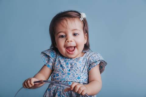 sorriso lindo no ensaio de 12 meses, ultimo ensaio de acompanhamento do primeiro ano de vida do Bebê, Brasilia DF'