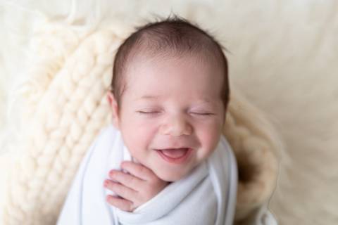 Sorriso no ensaio Newborn em Brasília'